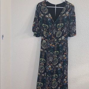 Floral jumpsuit open back size large